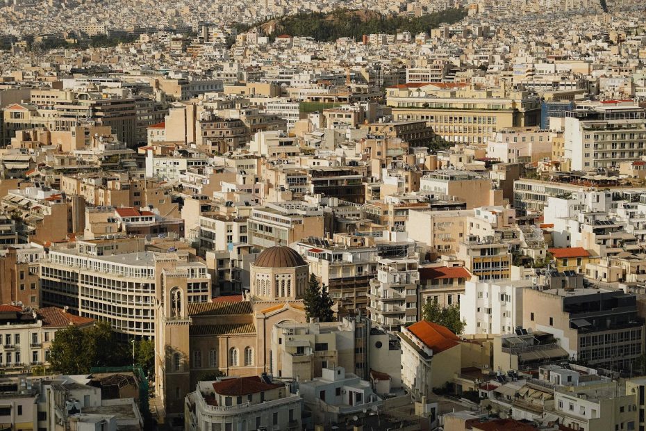 Breathtaking aerial view of Athens cityscape showcasing dense architecture and historic buildings.
